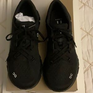 On Running Cloud X4, all Black Sneakers.